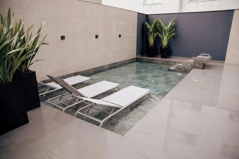 Stretch out in in-water loungers and soak up calm.