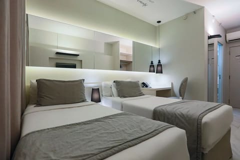 Settle into crisp twin beds for an easy night’s sleep.