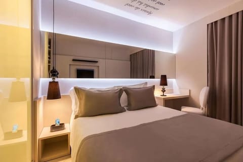 Sink into the plush bed under warm, relaxing ambient lights.