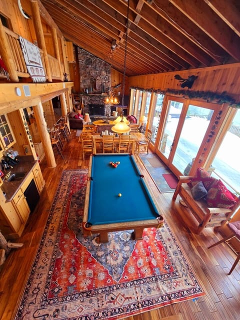 Our large open concept cabin has plenty of space for the entire group to spread out. We also have a large pool table and separate bar area so there are activities available for all!