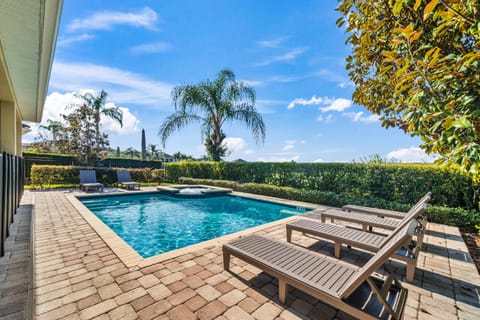 Soak up the sun by the private pool w/ loungers & lush greenery all around