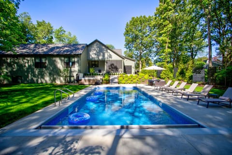Outdoor oasis: Heated pool and 8 person hot tub