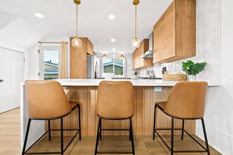 Cozy bar seating along the kitchen counter.