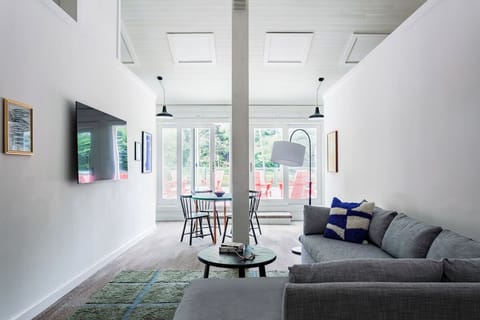 Gather comfortably in a sunlit lounge made for relaxing.
