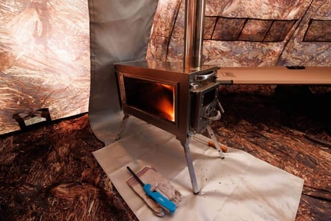 Wood stove, 2 cots, 2 camp chairs, LED Light