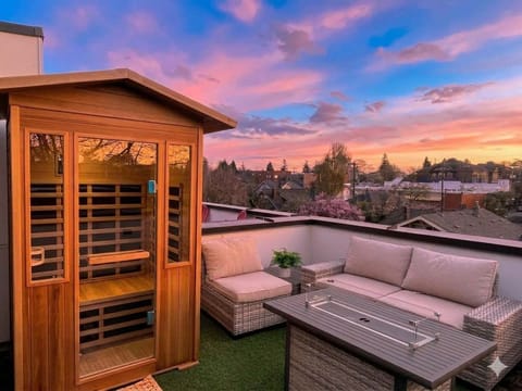 Wind down with stunning sunset colors as the rooftop transforms into a cozy evening escape.