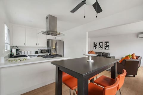 Dining area and fully stocked kitchen.