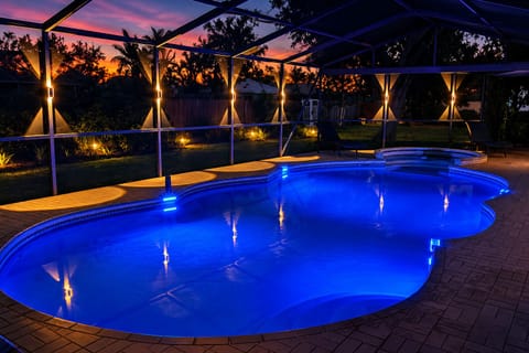 See beautiful sunsets from our pool. Lots of outdoor lighting. 