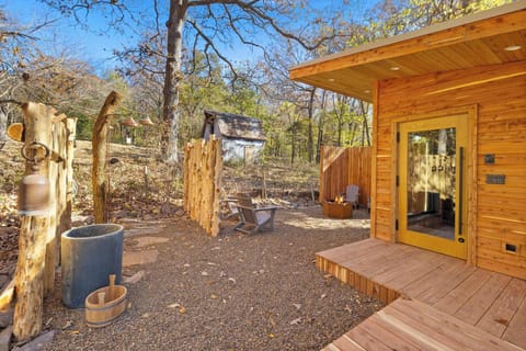 Nestled into wooded acreage, our property offers a large outdoor sauna & shower, fire pit, and access to private walking trails with art pieces along the path.