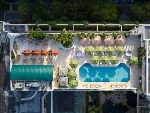 Soak up sunshine from above with umbrellas, loungers, and pool.