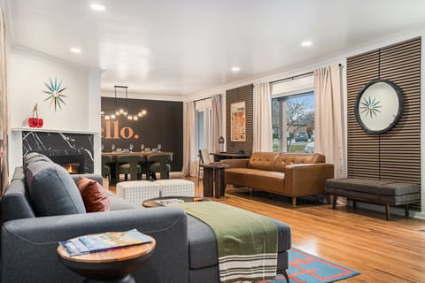 Enjoy the warm living room with abundant seating - perfect for gathering!