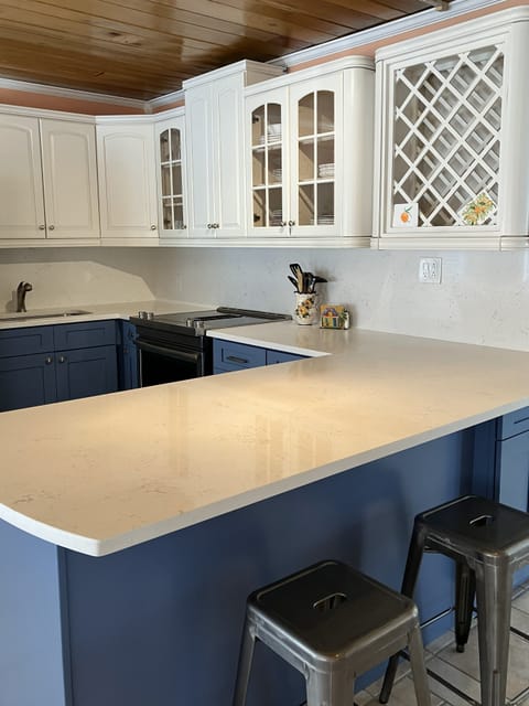 Enjoy a beautifully designed gourmet kitchen stocked with all utensils & sm app.