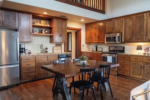 Fully stocked kitchen with all of the essentials and dining space.