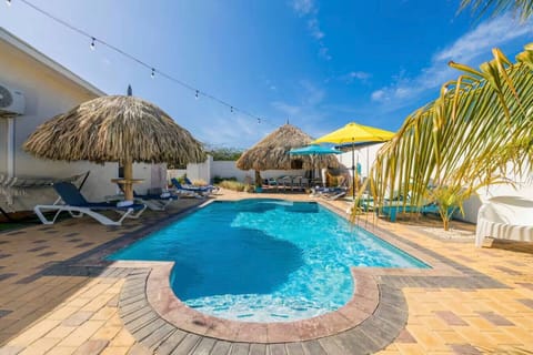 Enjoy a spacious pool with plenty of sun loungers and a shaded palapa. Made for laid-back days and quality time together.