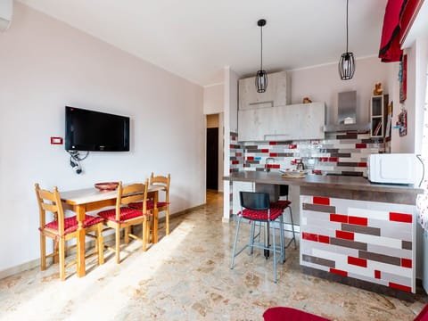 Furniture, Property, Table, Orange, Wood, Interior Design, Chair, Floor, Flooring, Wall
