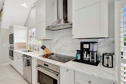 Cook with Ease in This Kitchen with Premium Appliances and Ample Counter Space