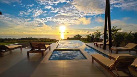 Pool patio and ocean 🌊 view (plenty of custom loungers with cushions)