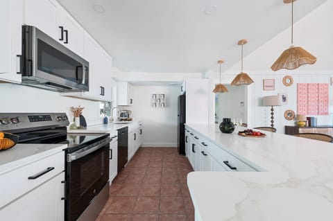 Cook like you’re at home—this kitchen is fully stocked (yes, even an air fryer) for everything from quick bites to big group meal