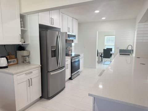 Fully stocked kitchen with induction cooktop