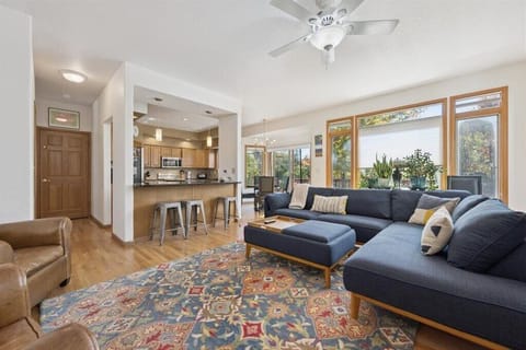 Relax in the great room with a large L-shape sofa and TV!