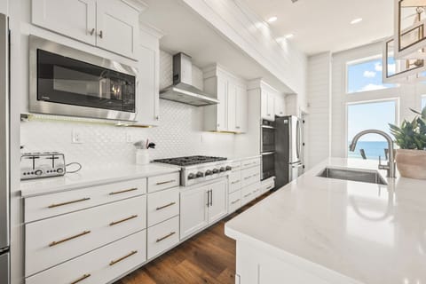 Kitchen with Bar Seating and Ocean Views on Third Level