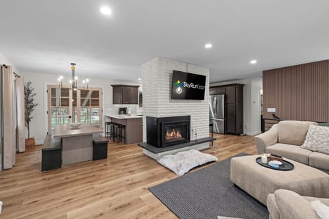 Open concept living, kitchen, and dining area