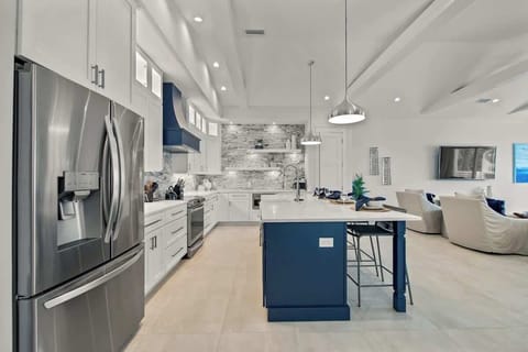 House A - Kitchen - Oversized Refrigerator -  Dishwasher - Oven - Large Gas Stove - Bar Seating for 4