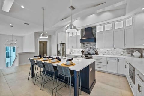 House A - Kitchen - Oversized Refrigerator -  Dishwasher - Oven - Large Gas Stove - Bar Seating for 4