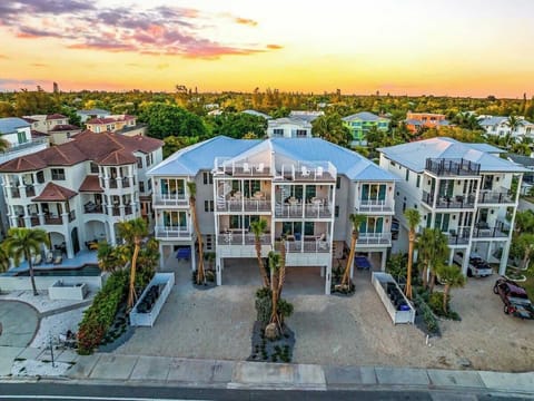 Twilight - Aerial Drone - Front Elevation - Gulfside Green Estate