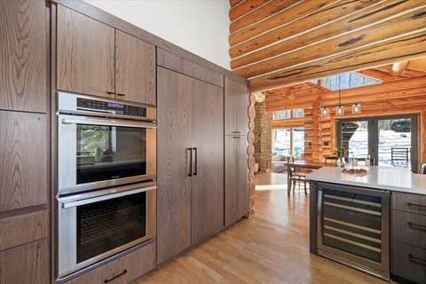 Kitchen: Drip coffee maker, toaster oven, kettle, cooking utensils, tableware