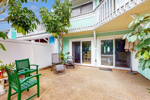 Enjoy a peaceful beach stay on this private tropical patio, perfect for morning coffee or evening relaxation. Just steps from the coast, this outdoor space adds comfort and charm to your seaside vacation getaway.