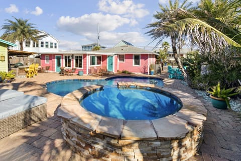 Backyard Oasis Featuring a Private Pool (Not Heated), Tiki Bar and Grills, and Ample Seating
