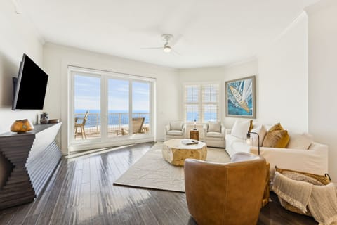 Gorgeous Oceanfront Views from the Luxurious Living Room Featuring Designer Decor and a Large Flat Screen Smart TV