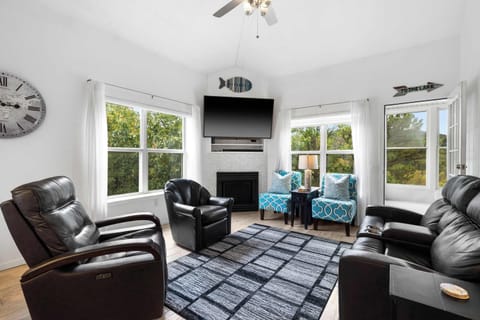 Curl up in the airy living room & stream your favorites on the smart TV​