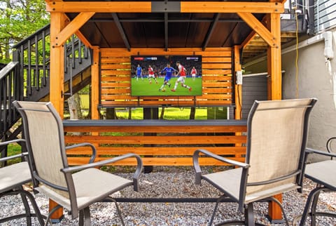 Unwind in the hot tub or catch the game at the tiki bar.