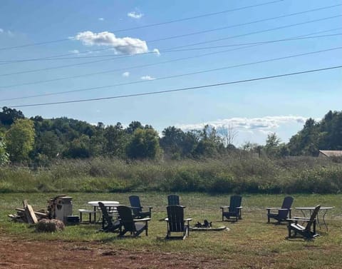 Common Area: Fire pit and chairs are available for all guests to use.