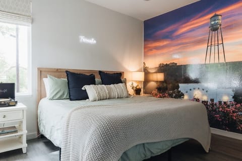 Waltz on into this cozy king bedroom for some relaxation