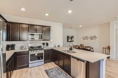 Another view of the awesome kitchen and kitchen island 