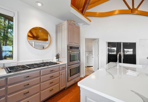 Modern appliances and elegant finishes in the kitchen.