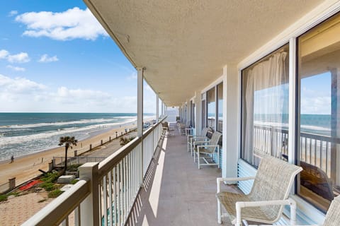 Relax on a private oceanfront balcony overlooking golden sands and rolling waves. This beachfront retreat offers front-row views, coastal breezes, and the perfect beach stay setting for sunrise coffee or sunset relaxation.