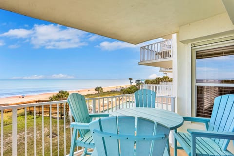 Relax on your private oceanfront balcony with panoramic beach views. This coastal vacation rental offers the perfect beach stay—steps to the sand, resort-style pool, and breathtaking sunrises over the water. Your ideal seaside getaway awaits.