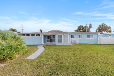 Welcome to your perfect beach stay! This bright coastal home offers a spacious lawn, inviting entry, and relaxed seaside charm—ideal for a laid-back vacation rental just minutes from sandy beaches, ocean breezes, and coastal adventures.