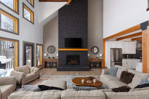 The Great Room brings together your whole group for football games and movie nights by the fire.