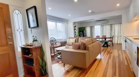 Bright open-plan living area with modern decor.