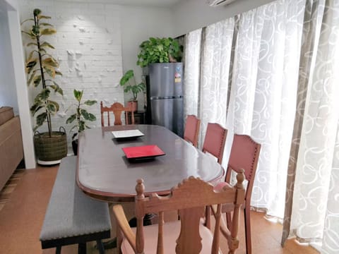 Spacious dining area ideal for shared meals and group gatherings.