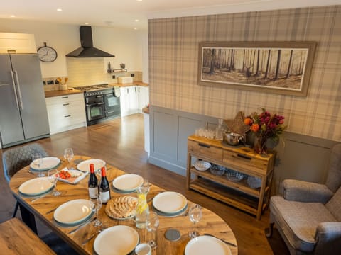 Another angle of the informal dining setting, highlighting the bright space and simple, comfortable decor.