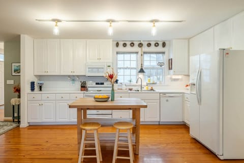 Bright functional workspace with island