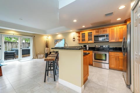 Fully equipped kitchen with stainless steel appliances