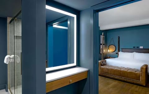 Transition from a moody vanity to restful sleep beyond.