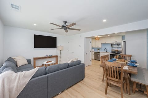 Cozy living room with a TV, perfect for relaxing after a day outdoors